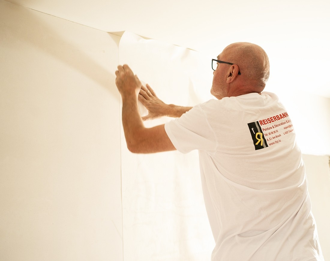 Peintre au travail
